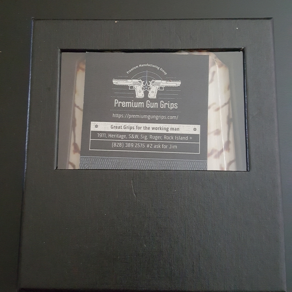 New in box,  grips for a 1911 style gun